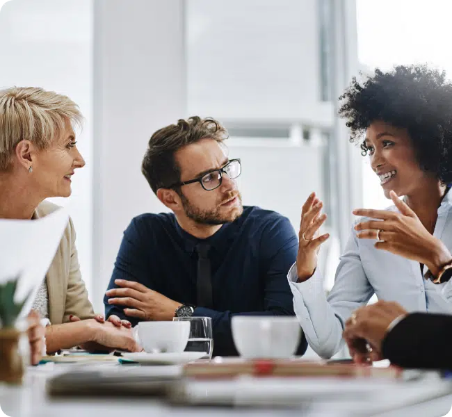 three colleagues in meeting